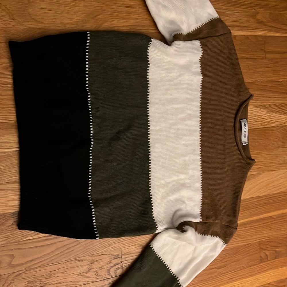 long sleeved sweater. black, brown, white, and green striped